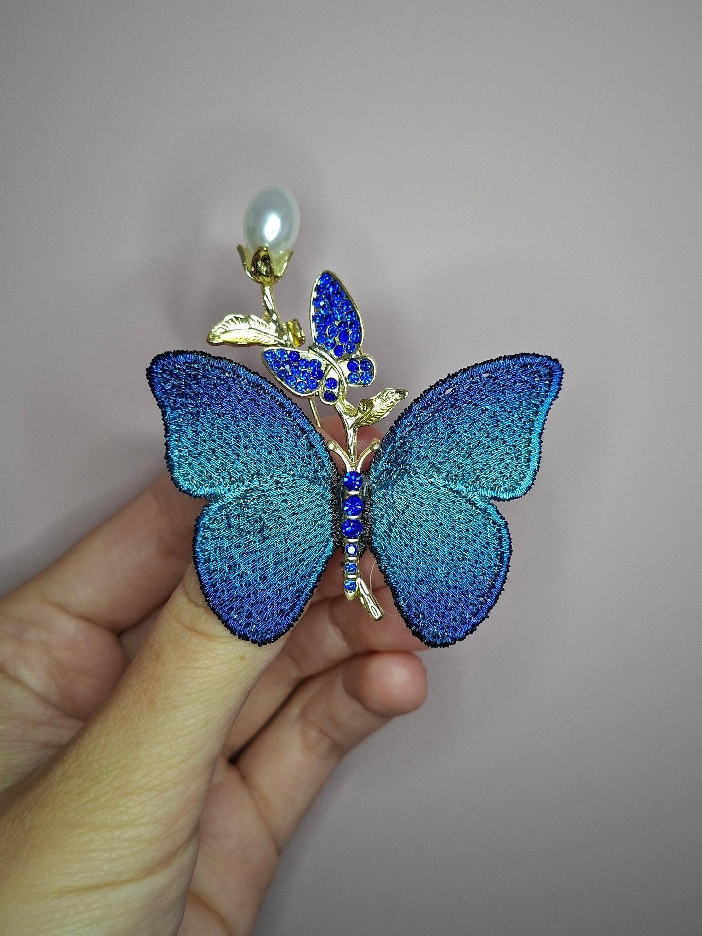 Broche S Vlinder blauw stof