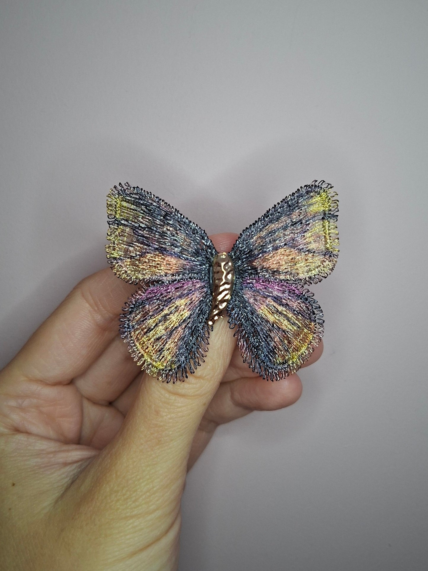 Broche S Vlinder stof meerkleurig