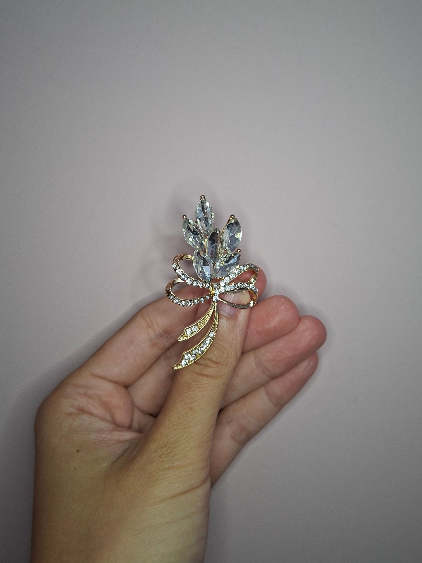 Broche M Goud Takje