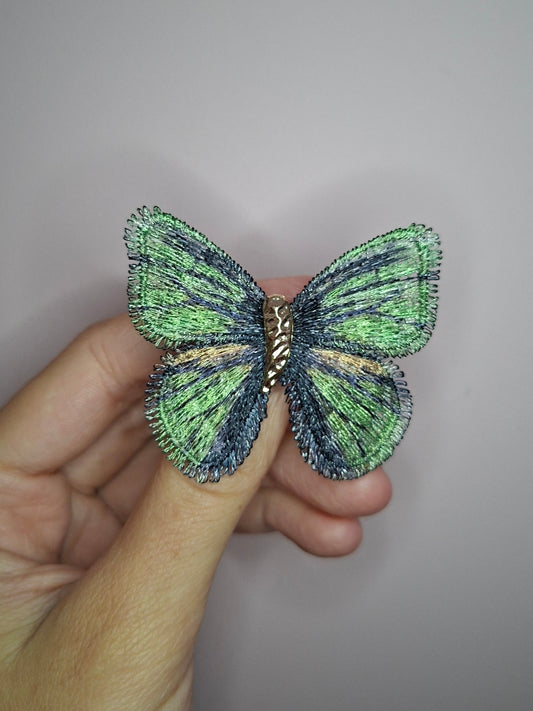 Broche S Vlinder stof groen
