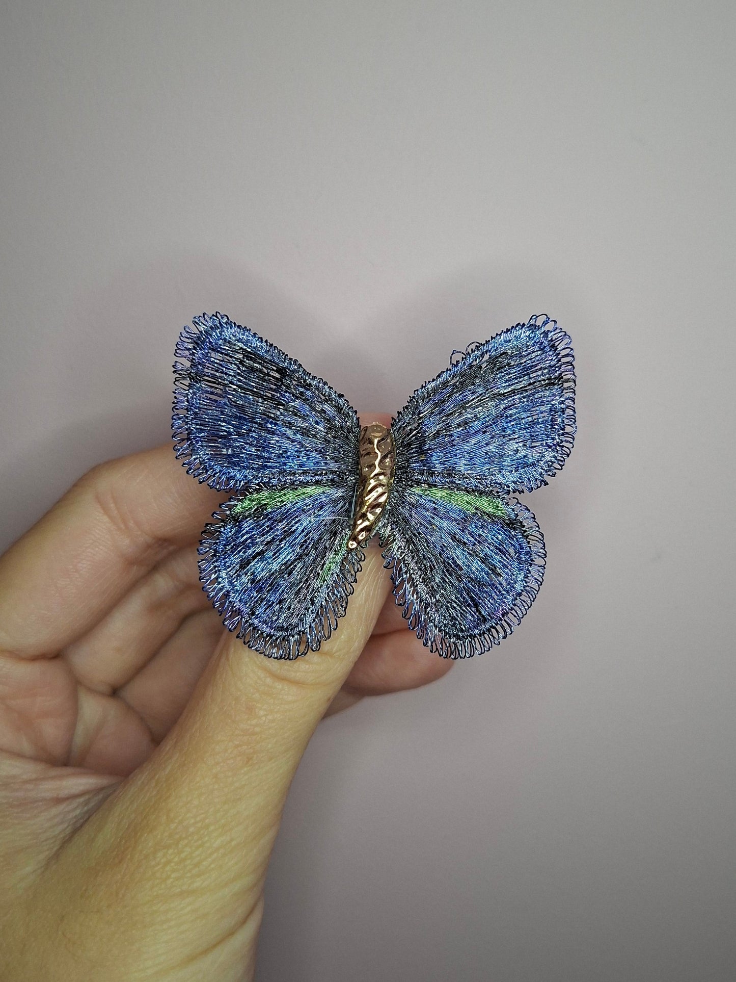 Broche S Vlinder stof blauw