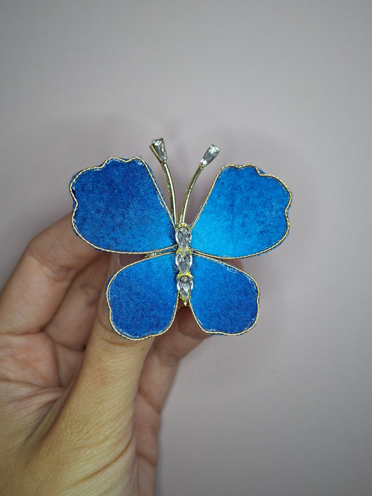 Broche S Vlinder stof helder blauw