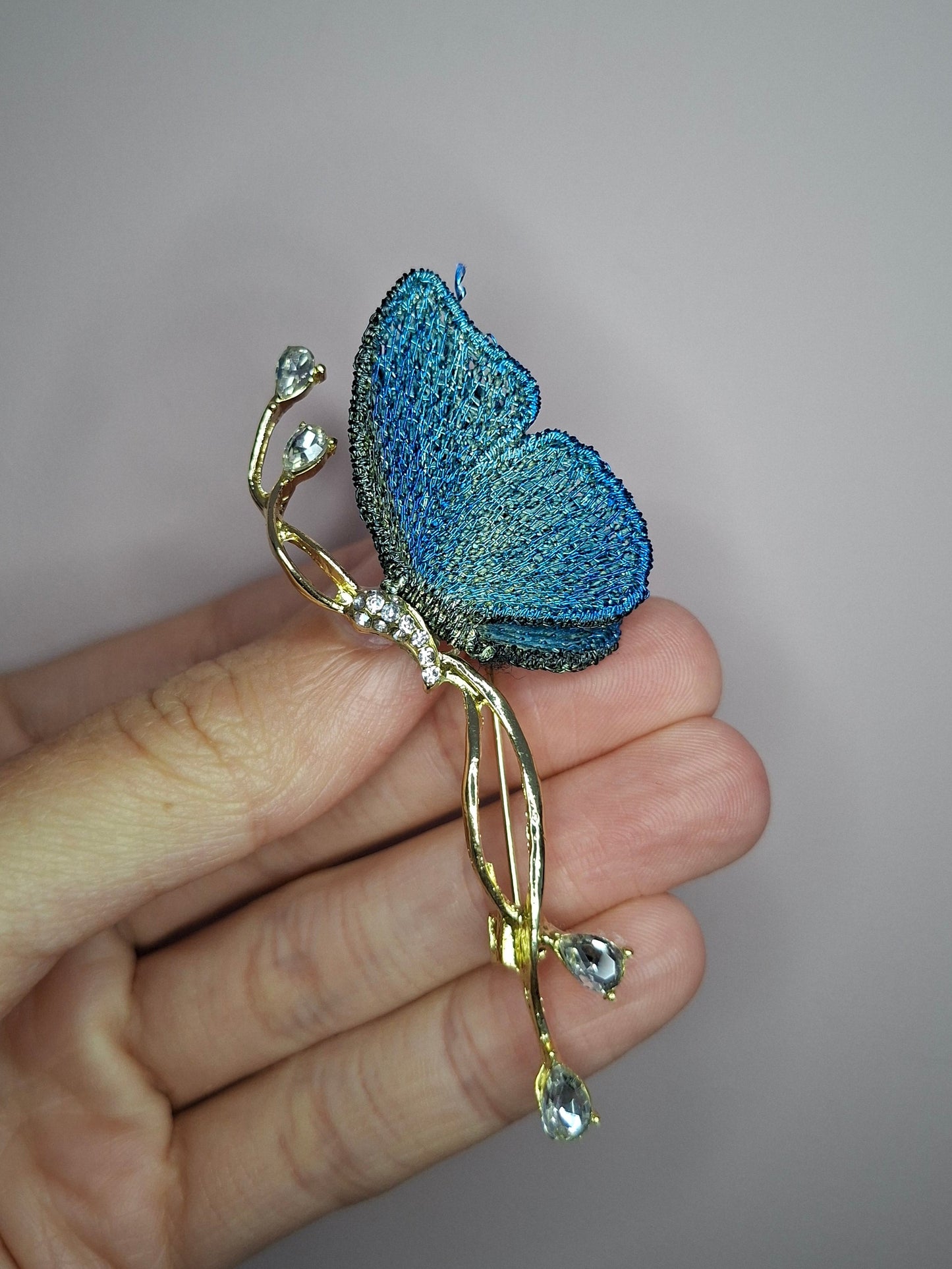 Broche M Vlindervleugel stof blauw