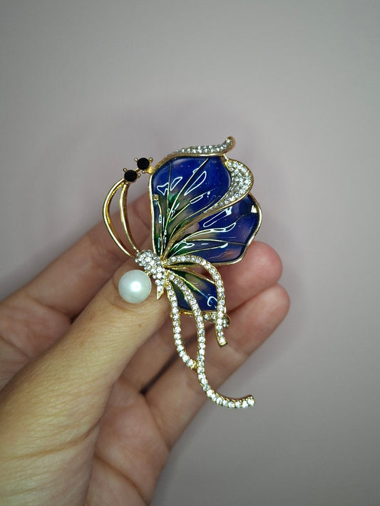 Broche M Vlindervleugel blauw parel